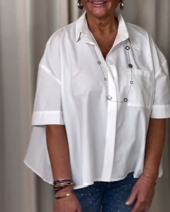 Rynkad blus med kort ärm