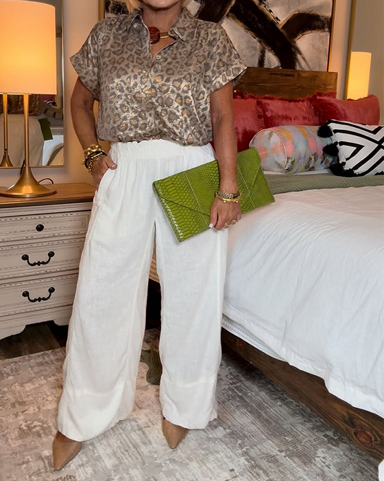 Blus avslappnad leopardmönstrad