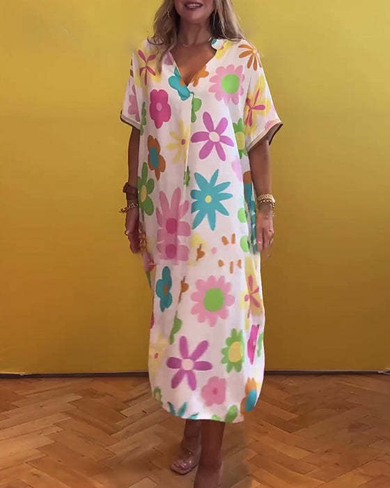 Lös V-ringad klänning med blommönster