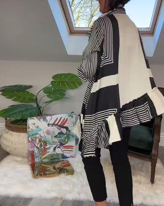 Modetryckt oregelbunden lapptröja med knappar