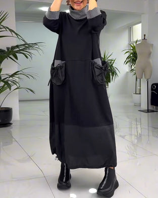 Avslappnad rutig lappklänning med hög krage