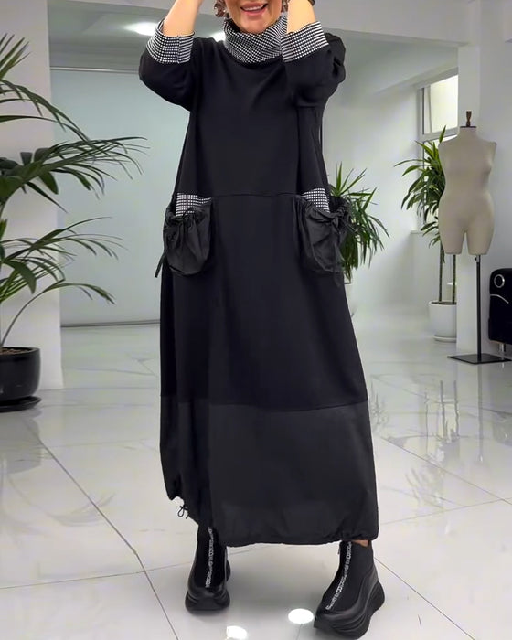 Avslappnad rutig lappklänning med hög krage