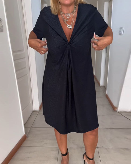 V-ringad kortärmad klänning