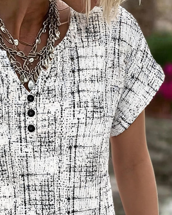 Blus Oregelbunden Rand Treknapp