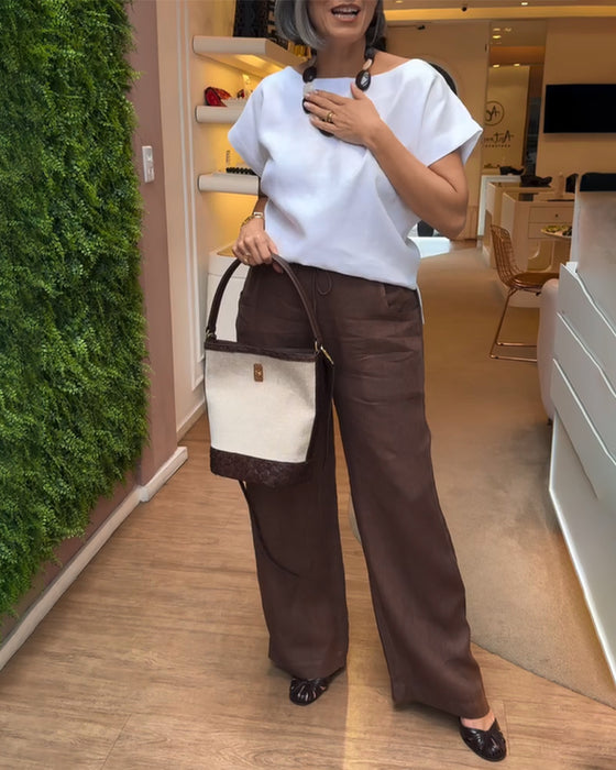 Vidsträckta Byxor Med En Färg, Relaxad Stil Och Dragkedja