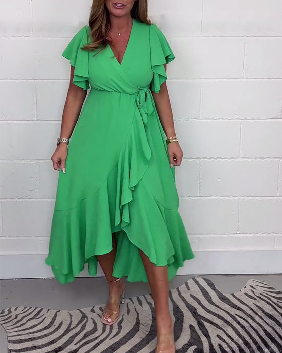 Volang elegant klänning i enfärgad slits