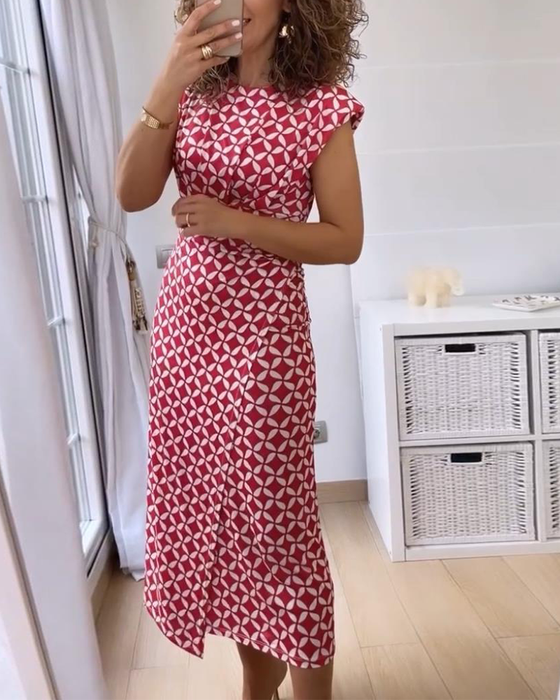 Geometriskt tryck ärmlös, rund halsad elegant klänning