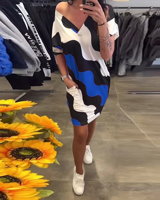 klänning V-ringad vågtryck