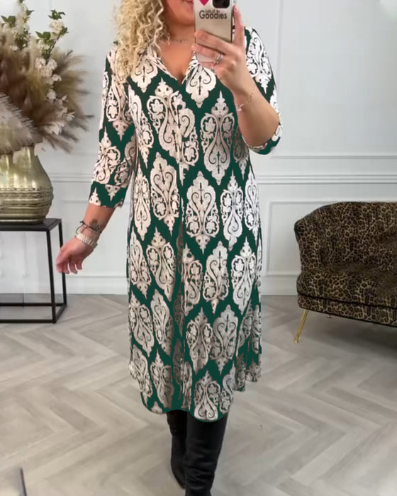 Lapelklänning med tryck i sidled