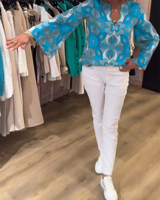 Blus med lösa, mångsidiga stilar och tryck