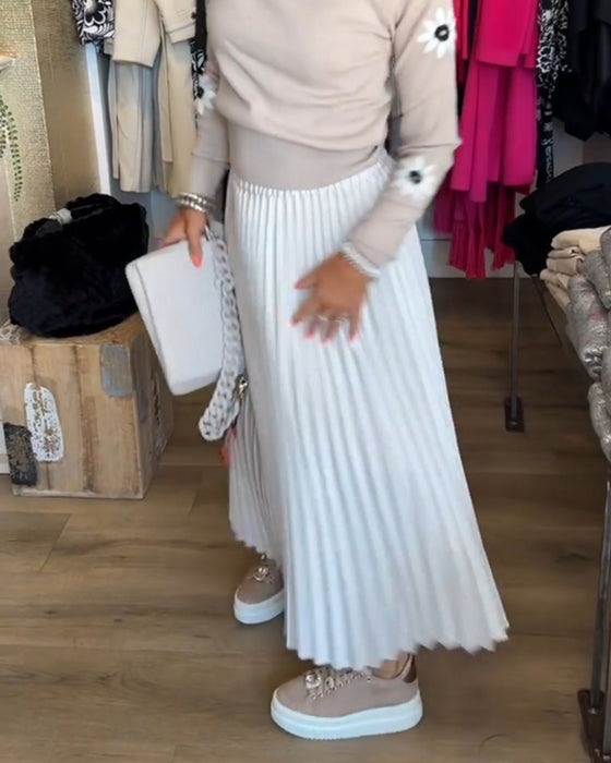 Plisserad enfärgad klänning