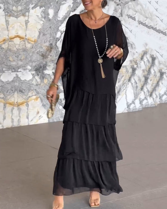 Klänning med konstnärlig stil och lös passform