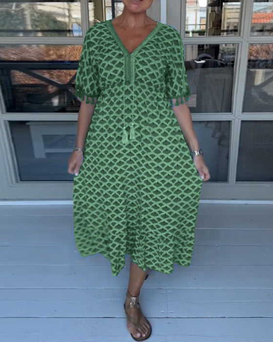 V-ringad ledig klänning med tryck