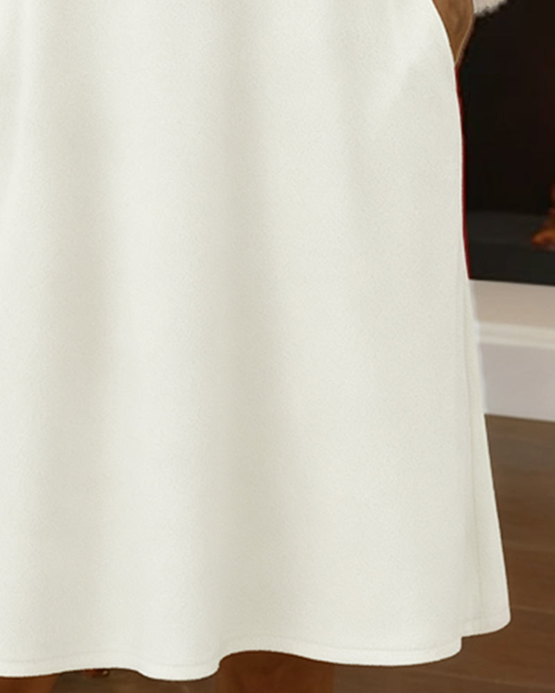 Klänning Med Lurvig Kontrast Och V-Ringning