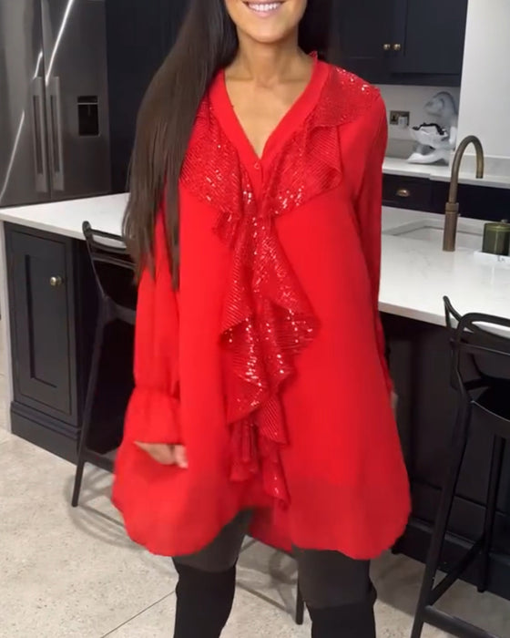 Blus med volanger och elegant stil