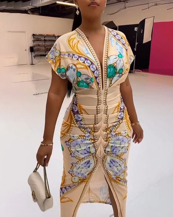 Klänning med djup V-slits i midjan