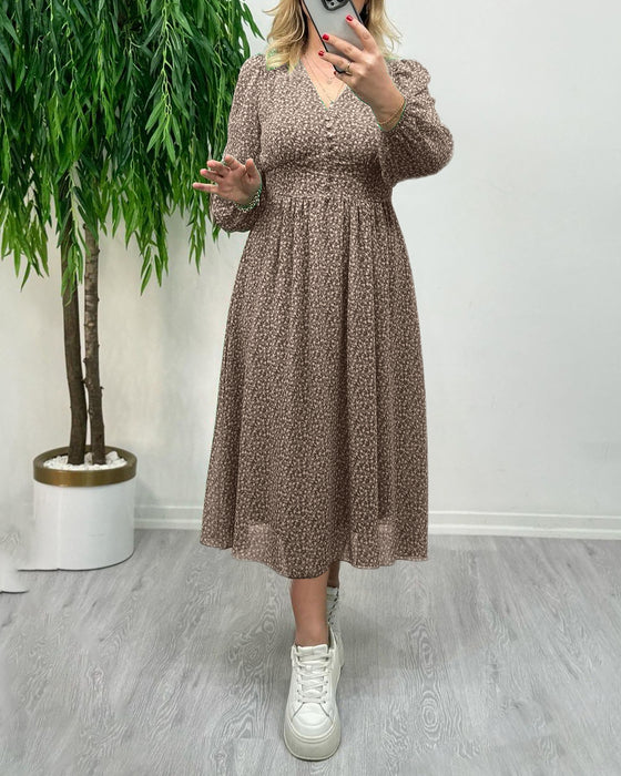 Elegant klänning med tryck