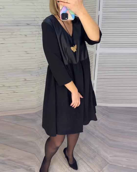 Patchwork klänning med V-ringning