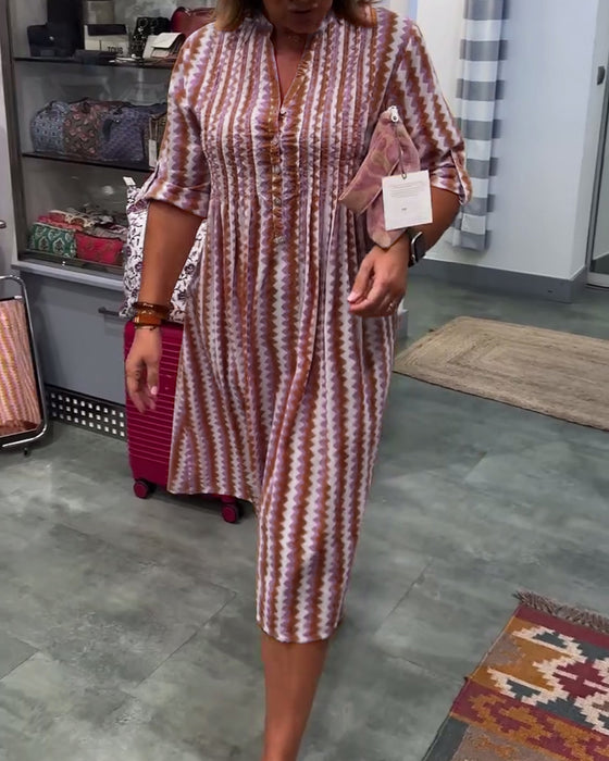 Klänning med vågmönster