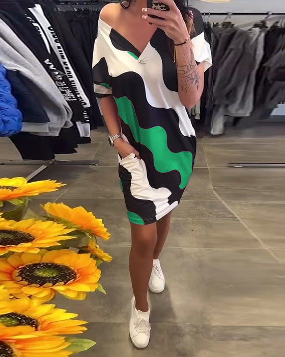 klänning V-ringad vågtryck