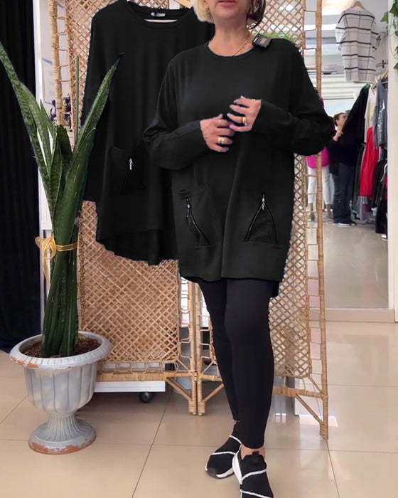 Enfärgad dragkedja i enfärgad tröja med rund hals