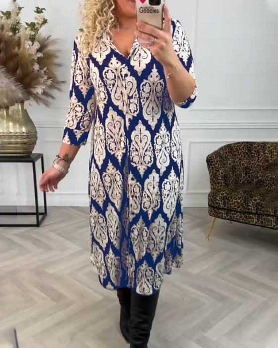 Lapelklänning med tryck i sidled