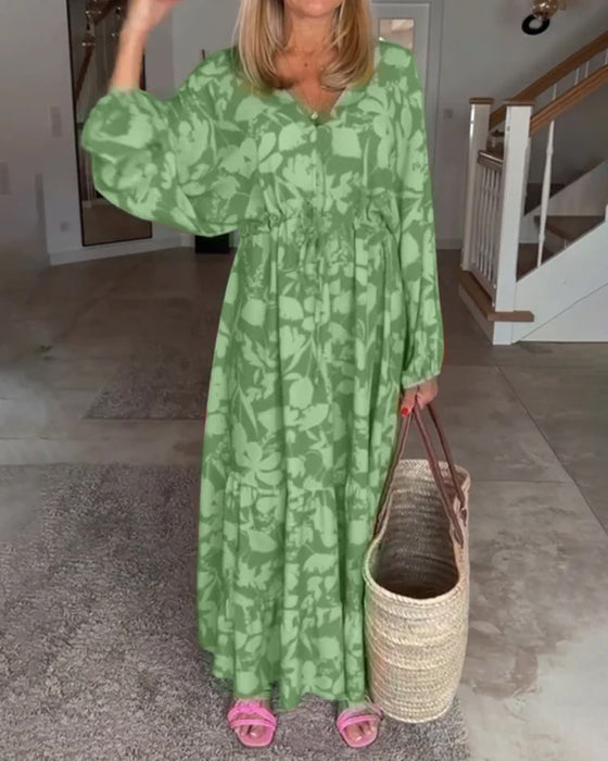 Blommig långärmad klänning