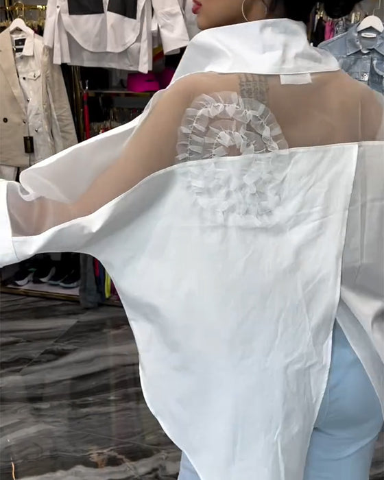 Lapelblom i spets med lapptäcke