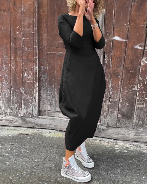 Enkel långärmad klänning i enfärgad ficka