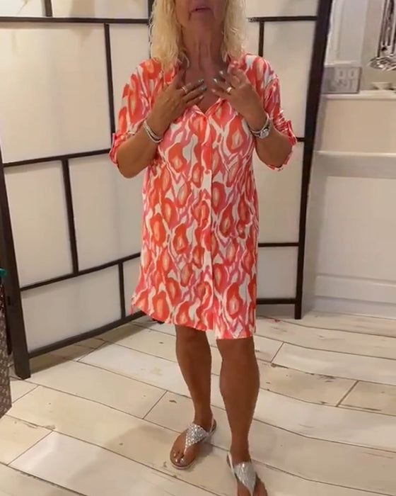 Klänning med knappar och mittärmar med slag