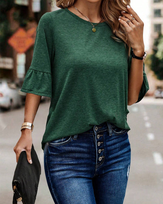 Enfärgad knapp baktill elegant topp