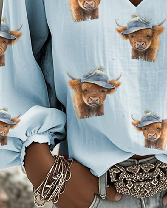 V-Ringad Blus Med Djurmönster Och Puffärmar