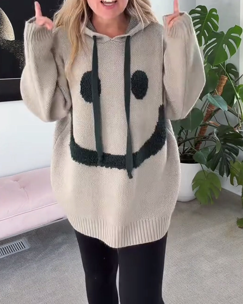 Tröja med smiley-motiv och lös luva