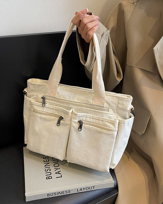 Enfärgad manchesterväska