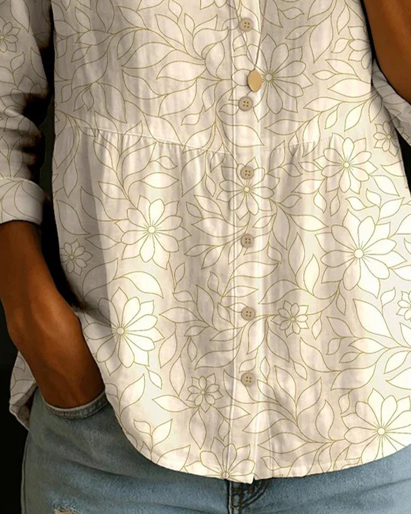 Mönstrad Blus Med V-Ringning Och Knäppning Framtill