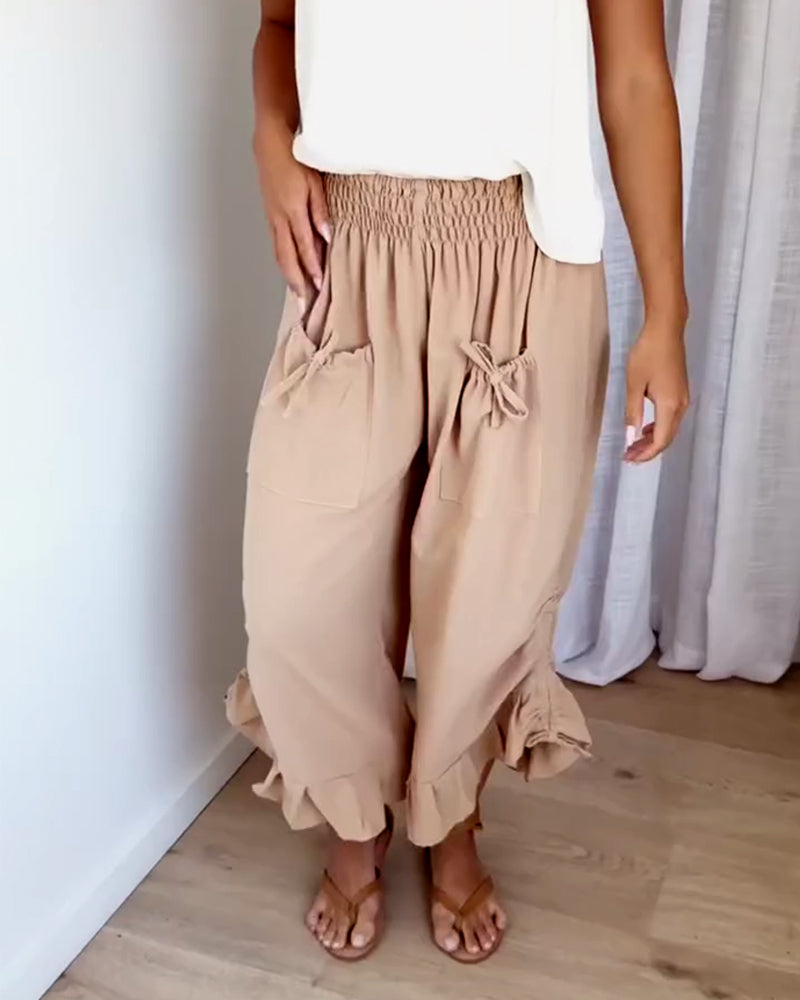 Snygg fickdesign med resår i midjan på byxorna