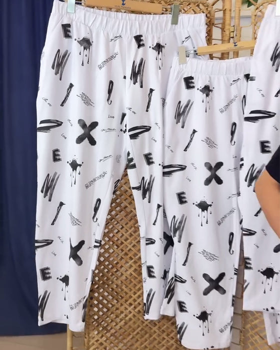 Byxor i mellanhög avslappnad tryck