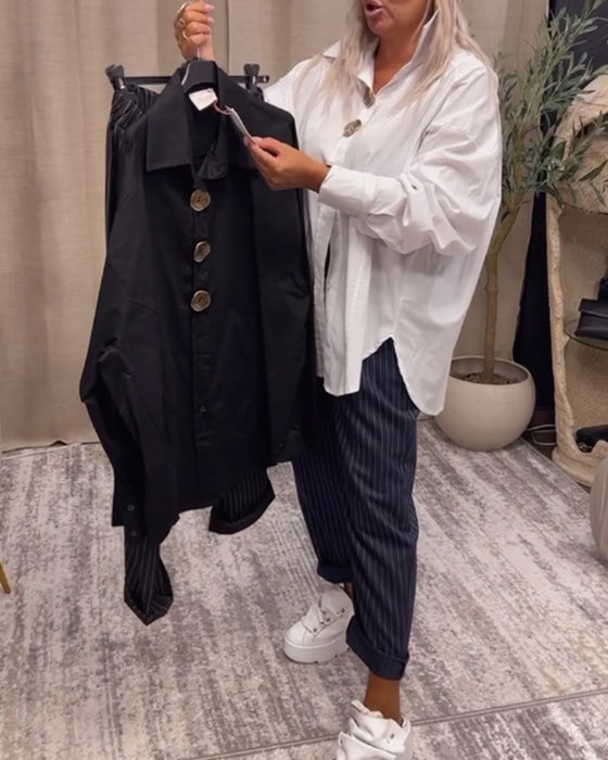 Snygg enfärgad skjorta med lapelknapp