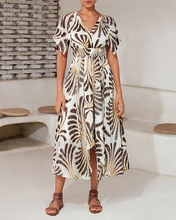 Tryckt V-ringad oregelbunden elegant klänning