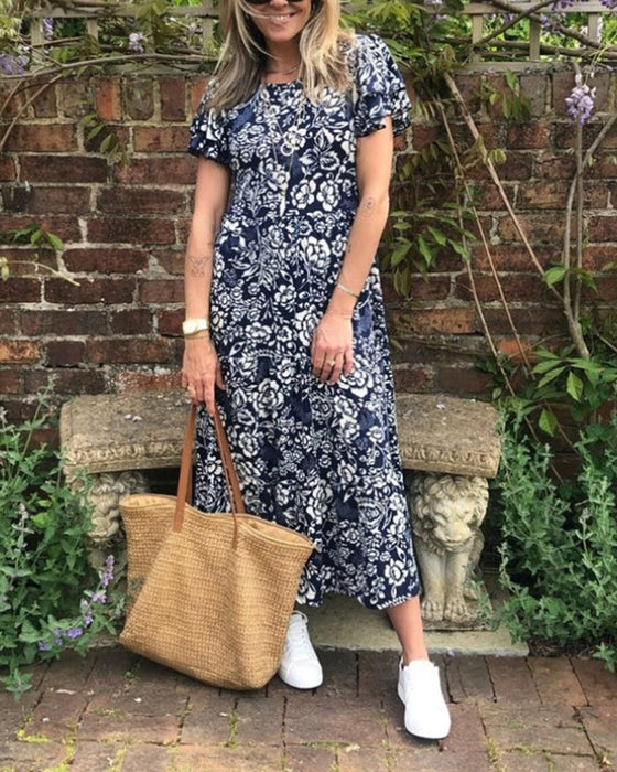 Kortärmad långklänning med blommönster