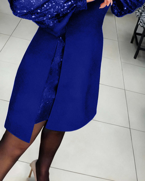 Elegant Klänning Med Puffärmar Och Lapptäcktsdetaljer