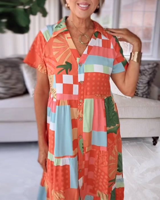 Klänning V-Ringad Kortärmad Mönstrad Ledig