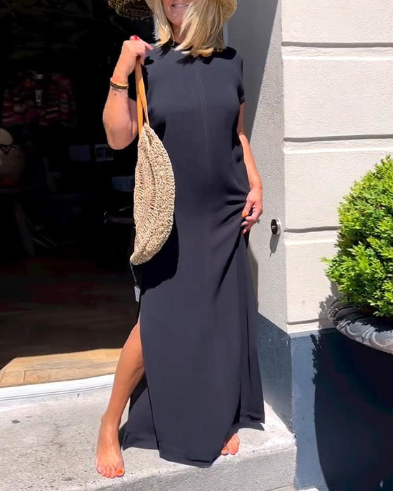 Elegant klänning med korta ärmar i enfärgad