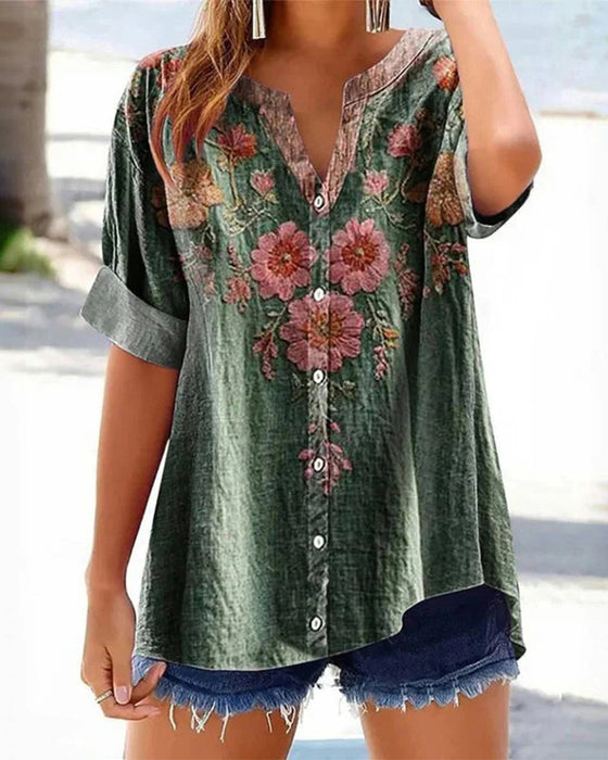 Blus med modetryck och v-ringning