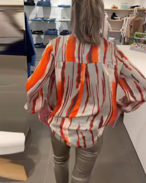 Långärmad blus med randigt tryck