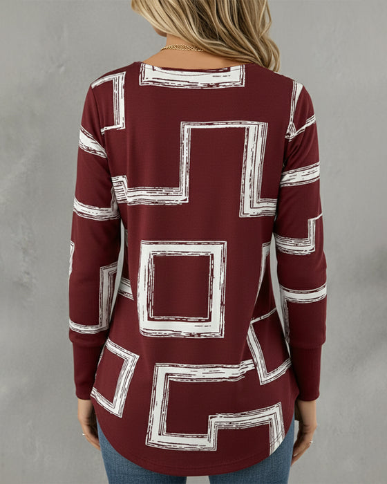 Top Långärmad Med Sned Halsringning Och Grafiskt Tryck