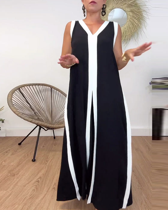 Trendig ärmlös klänning med V-ringad kontrasttryck