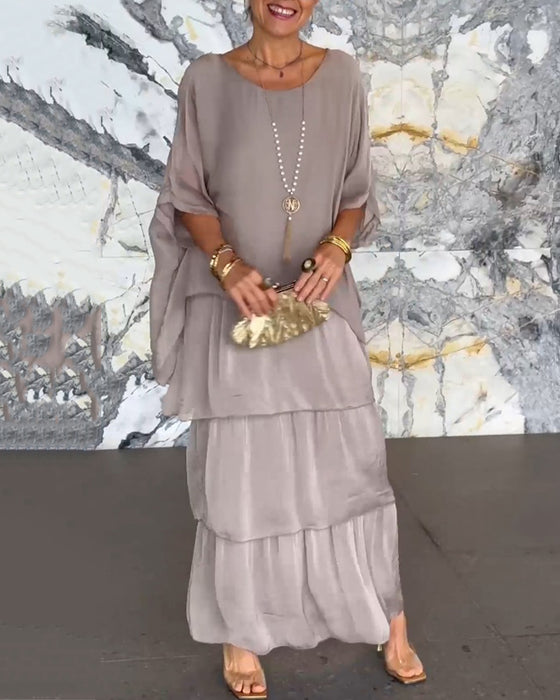 Klänning med konstnärlig stil och lös passform