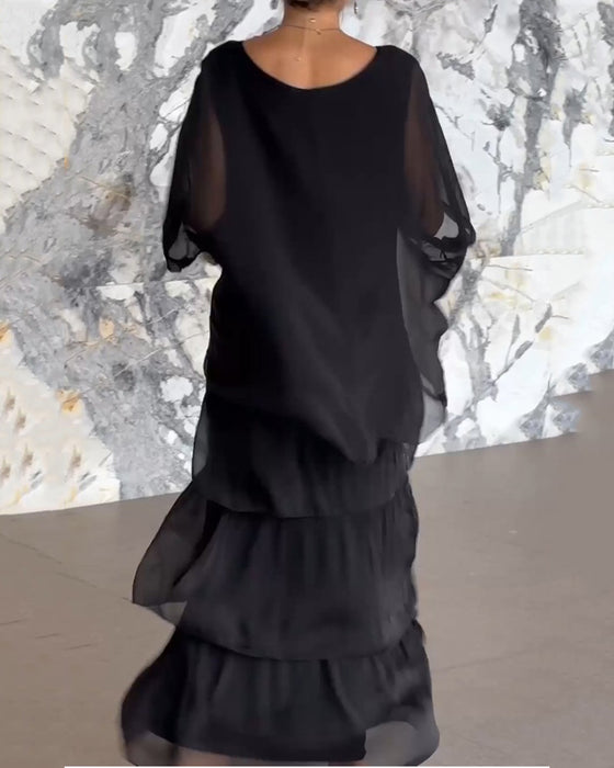 Klänning med konstnärlig stil och lös passform