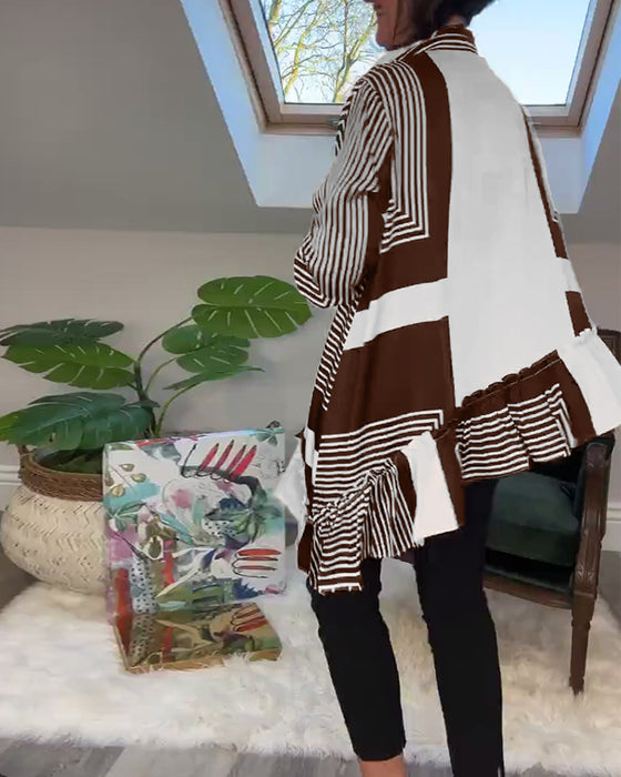 Modetryckt oregelbunden lapptröja med knappar